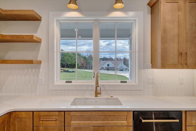 120 Pointe O Woods Dr, Huddleston, VA 24104 - kitchen featuring dishwashing machine, a sink, tasteful backsplash, brown cabinets, and open shelves