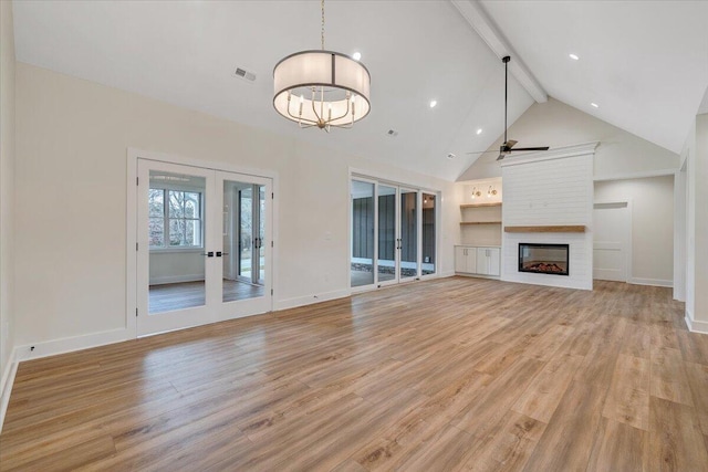 120 Pointe O Woods Dr, Huddleston, VA 24104 - unfurnished living room with beamed ceiling, light wood-style flooring, high vaulted ceiling, french doors, and a large fireplace