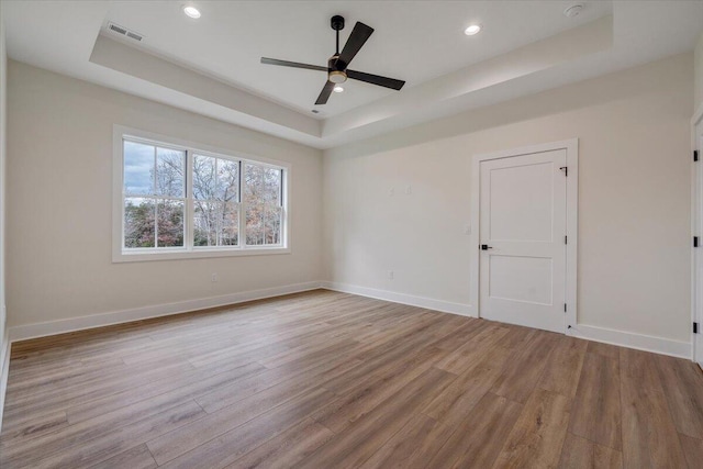 120 Pointe O Woods Dr, Huddleston, VA 24104 - unfurnished room featuring a raised ceiling, wood finished floors, a ceiling fan, baseboards, and recessed lighting