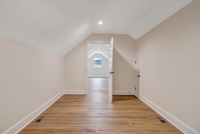 120 Pointe O Woods Dr, Huddleston, VA 24104 - additional living space with vaulted ceiling, light wood-type flooring, recessed lighting, and baseboards