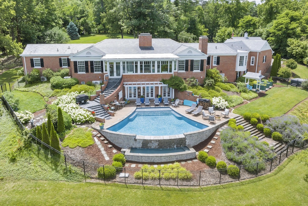 4134 Lake Dr SW, Roanoke, VA 24018 - rear view of property with a chimney, a fenced backyard, a patio area, and stairway