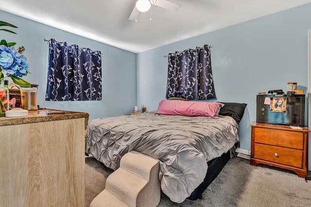 bedroom featuring ceiling fan and carpet floors