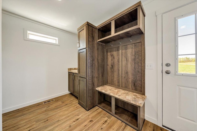 2227 Hendricks Store Rd, Moneta, VA 24121 - mudroom featuring visible vents, baseboards, and light wood finished floors