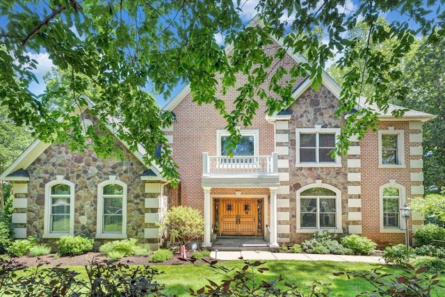 723 Fox Chase Rd, Wirtz, VA 24184 - view of front of house featuring stone siding and a balcony