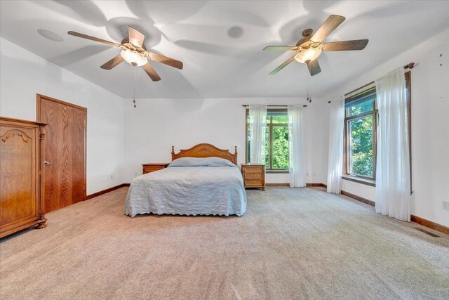 723 Fox Chase Rd, Wirtz, VA 24184 - bedroom with carpet, baseboards, and ceiling fan