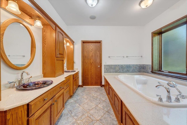 723 Fox Chase Rd, Wirtz, VA 24184 - full bath featuring a garden tub, vanity, and tile patterned flooring
