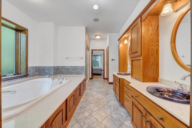 723 Fox Chase Rd, Wirtz, VA 24184 - bathroom with a bath, ensuite bath, vanity, and tile patterned floors