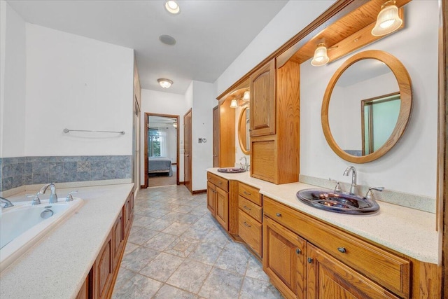 723 Fox Chase Rd, Wirtz, VA 24184 - bathroom featuring double vanity, a bath, and connected bathroom