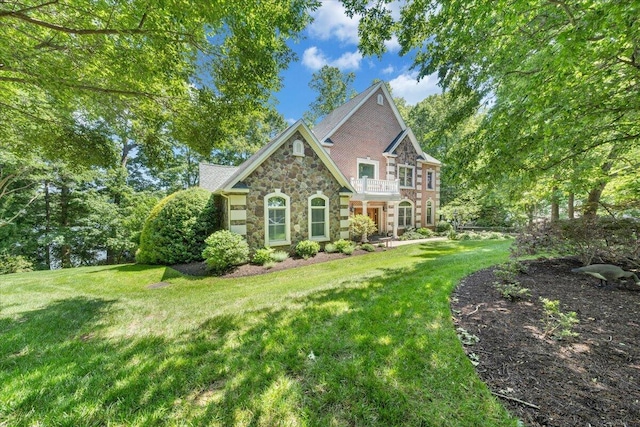 723 Fox Chase Rd, Wirtz, VA 24184 - view of front of property featuring stone siding, a front lawn, and a balcony