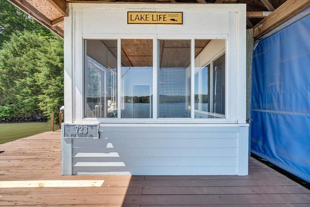 723 Fox Chase Rd, Wirtz, VA 24184 - wooden deck with a sunroom