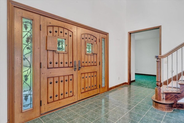 723 Fox Chase Rd, Wirtz, VA 24184 - entrance foyer with stairs and baseboards