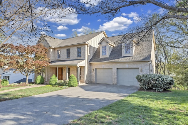 3649 Peakwood Dr SW, Roanoke, VA 24014 - traditional-style house with concrete driveway, a shingled roof, a front lawn, and a porch