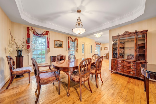 3649 Peakwood Dr SW, Roanoke, VA 24014 - dining space with a tray ceiling, light wood-type flooring, and ornamental molding