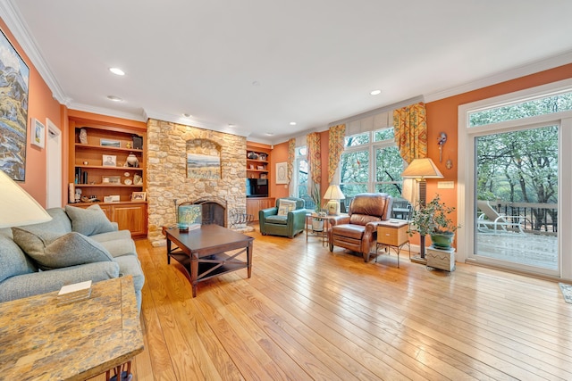 3649 Peakwood Dr SW, Roanoke, VA 24014 - living area with ornamental molding, light wood-style floors, a fireplace, recessed lighting, and built in shelves