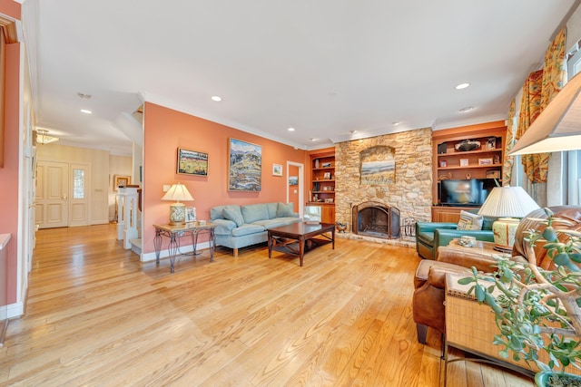 3649 Peakwood Dr SW, Roanoke, VA 24014 - living room with light wood-type flooring, crown molding, recessed lighting, a fireplace, and built in features