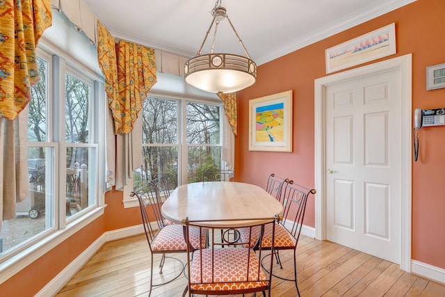 3649 Peakwood Dr SW, Roanoke, VA 24014 - dining area featuring light wood-style floors and ornamental molding