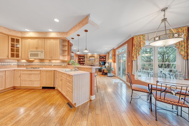 3649 Peakwood Dr SW, Roanoke, VA 24014 - kitchen featuring white appliances, light brown cabinets, open floor plan, open shelves, and glass insert cabinets