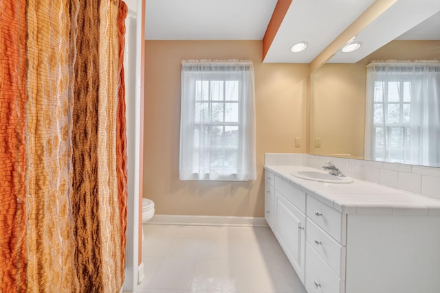3649 Peakwood Dr SW, Roanoke, VA 24014 - bathroom featuring vanity, plenty of natural light, tile patterned floors, and recessed lighting
