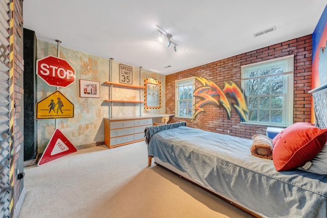 3649 Peakwood Dr SW, Roanoke, VA 24014 - carpeted bedroom featuring brick wall and baseboards