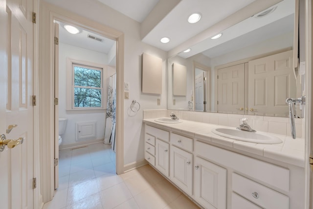 3649 Peakwood Dr SW, Roanoke, VA 24014 - bathroom with double vanity, tile patterned flooring, and recessed lighting