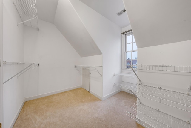 3649 Peakwood Dr SW, Roanoke, VA 24014 - walk in closet featuring light carpet and lofted ceiling