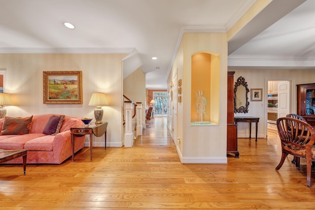 3649 Peakwood Dr SW, Roanoke, VA 24014 - hall featuring light wood-style flooring, ornamental molding, arched walkways, and recessed lighting
