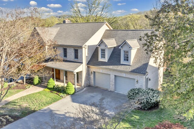 3649 Peakwood Dr SW, Roanoke, VA 24014 - view of front of house featuring a porch, driveway, an attached garage, and a shingled roof