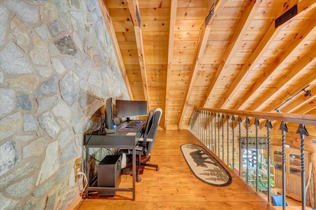 office area featuring beamed ceiling, hardwood / wood-style floors, and wood ceiling