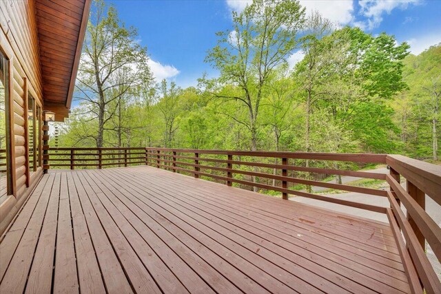 deck with a wooded view