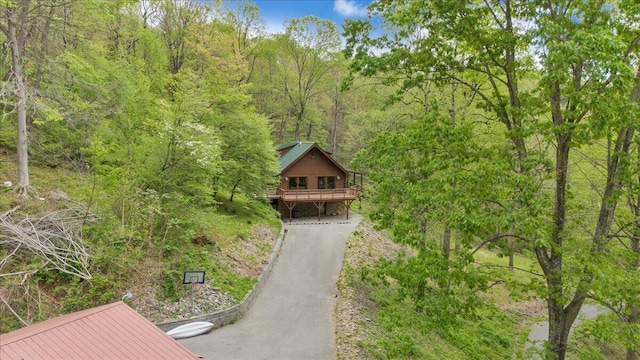 aerial view featuring a view of trees
