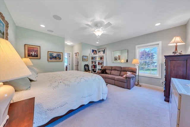 bedroom with light colored carpet, baseboards, a ceiling fan, and recessed lighting