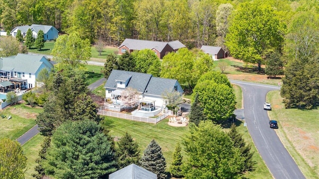 bird's eye view with a view of trees and a residential view