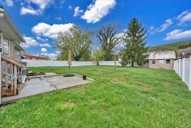 1944 Burma Rd, Salem, VA 24153 - view of yard featuring a patio area, a fenced backyard, and an outdoor structure