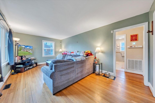 1944 Burma Rd, Salem, VA 24153 - living area with wood finished floors, baseboards, and visible vents