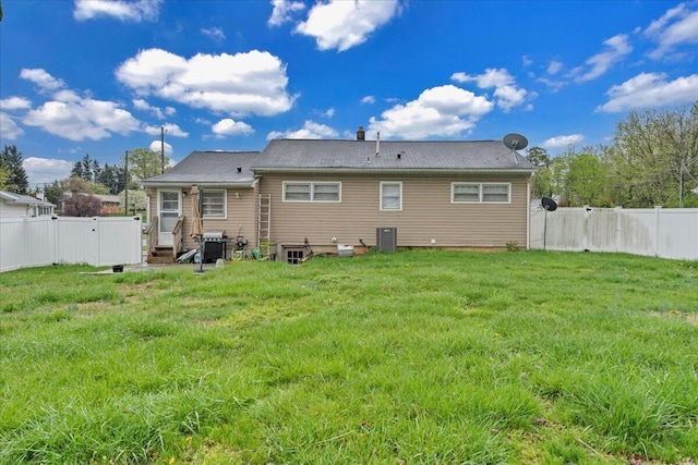 1944 Burma Rd, Salem, VA 24153 - back of house with a yard, a fenced backyard, central AC, and entry steps