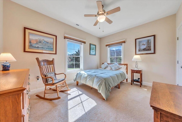 398 River Ridge Rd SE, Copper Hill, VA 24079 - bedroom featuring baseboards, light colored carpet, and a ceiling fan