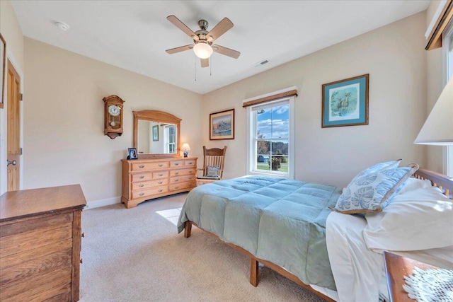 398 River Ridge Rd SE, Copper Hill, VA 24079 - bedroom featuring light carpet, baseboards, and a ceiling fan