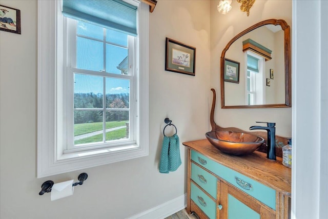 398 River Ridge Rd SE, Copper Hill, VA 24079 - bathroom featuring healthy amount of natural light, vanity, and baseboards