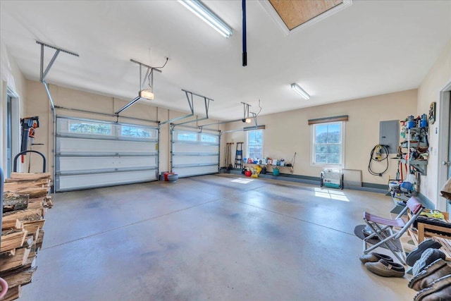 398 River Ridge Rd SE, Copper Hill, VA 24079 - garage featuring a garage door opener and electric panel