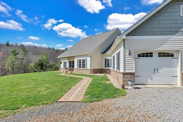 398 River Ridge Rd SE, Copper Hill, VA 24079 - view of home's exterior with a garage, a lawn, brick siding, and gravel driveway