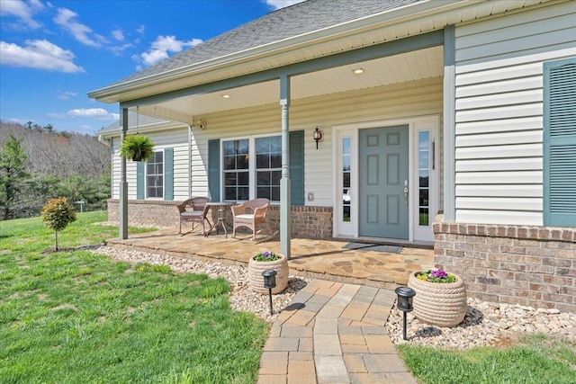 398 River Ridge Rd SE, Copper Hill, VA 24079 - property entrance featuring brick siding, a shingled roof, and a lawn