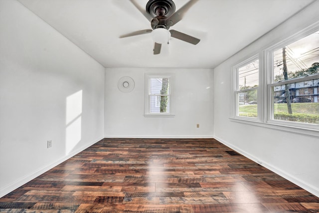 2513 Liberty Rd NW, Roanoke, VA 24012 - spare room with dark wood-style flooring, a ceiling fan, and baseboards