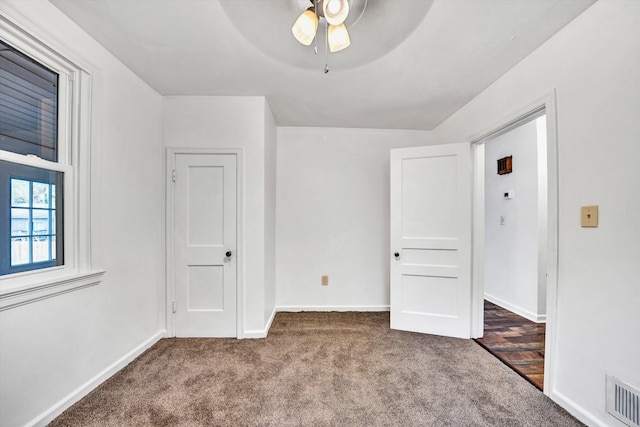2513 Liberty Rd NW, Roanoke, VA 24012 - unfurnished bedroom featuring carpet floors, baseboards, and a ceiling fan