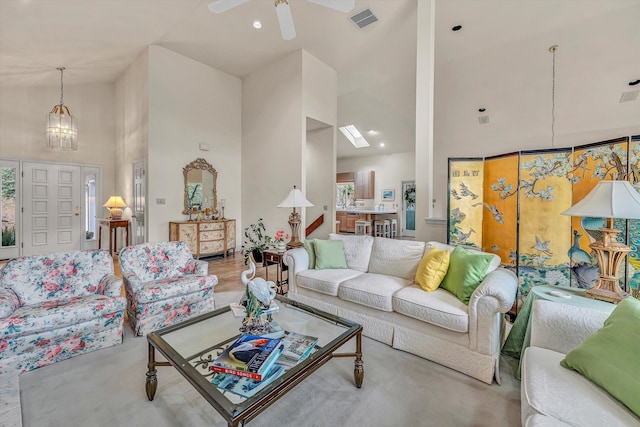 living room featuring recessed lighting, visible vents, a ceiling fan, and high vaulted ceiling