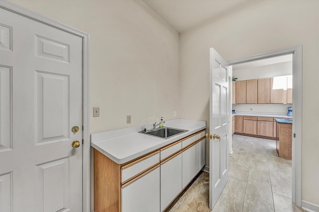laundry room featuring a sink