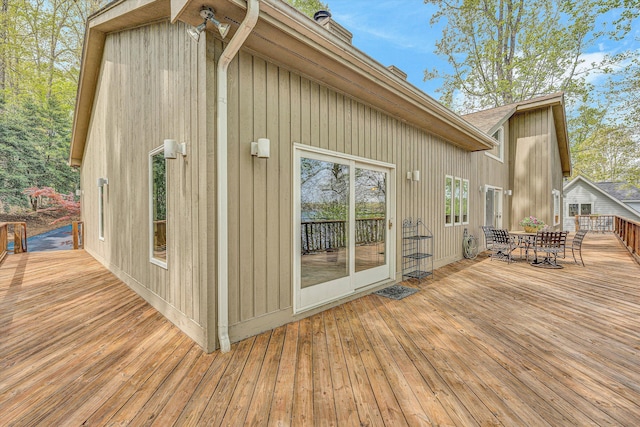 wooden deck with outdoor dining area