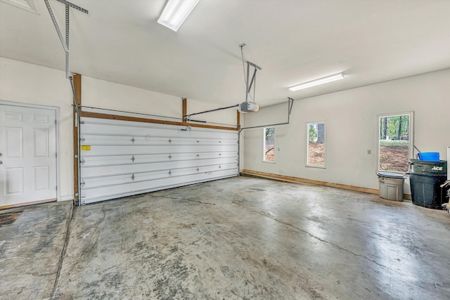 garage featuring a garage door opener