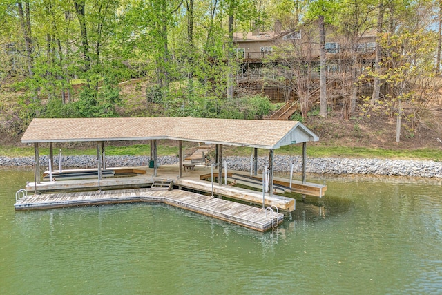 view of dock with a water view and boat lift