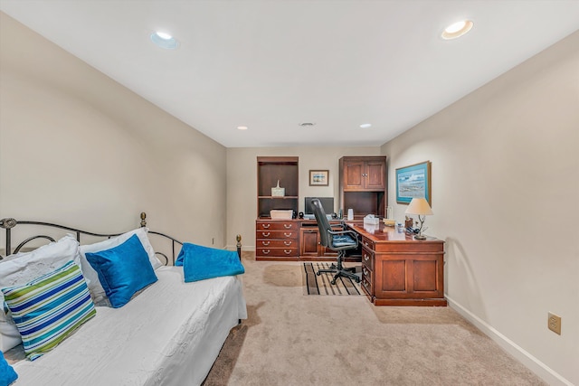 bedroom featuring recessed lighting, baseboards, and light carpet