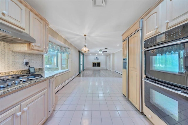 5241 N Spring Dr, Roanoke, VA 24019 - kitchen featuring light tile patterned floors, a ceiling fan, decorative backsplash, under cabinet range hood, and open floor plan